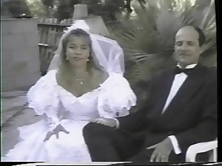 French girl gets fucked while wearing a white wedding dress